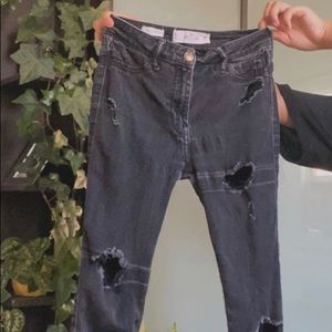 high waisted black ripped jeans